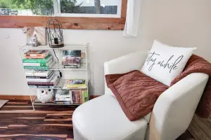 Highland & Co. Acres Shipping Container Home - Cozy Reading Nook for Relaxation