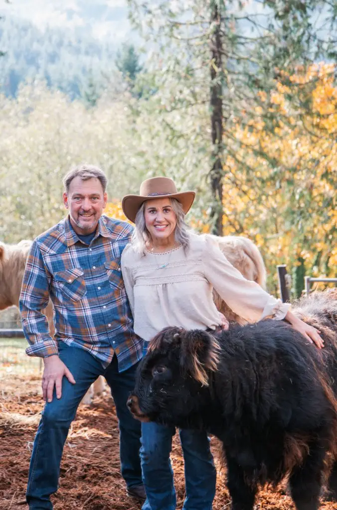 Highland & Co Acres owners with black Highland cattle calf Cowlitz County Washington AHCA registered breeder contact information